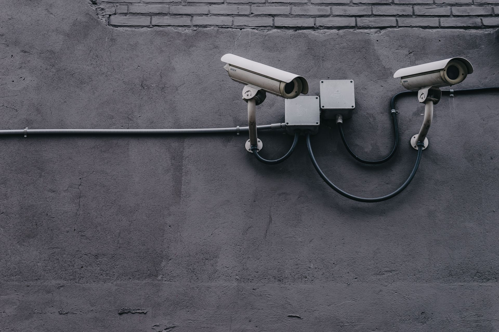 SecureVision team installing CCTV cameras